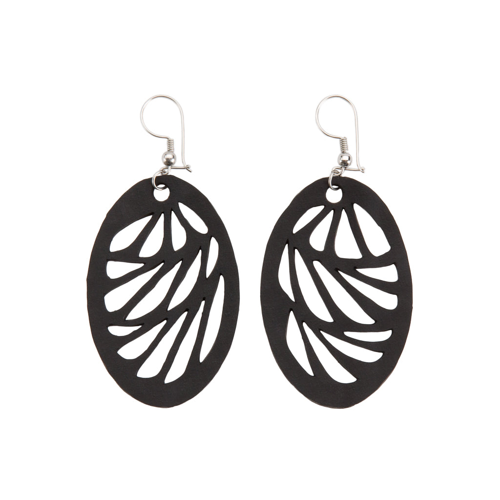 Paguro Upcycle black oval recycled rubber earrings with leaf cutout design and silver hooks