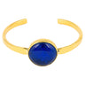 Paguro Upcycle recycled brass bangle with a round blue stone centerpiece bracelet