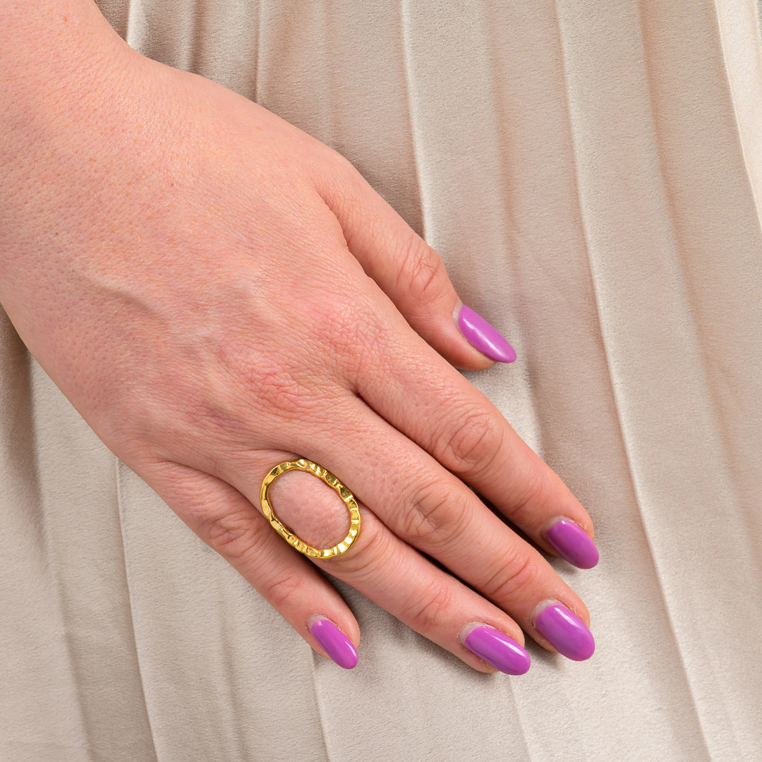 Paguro Upcycle recycled brass adjustable ring worn on finger with purple nail polish