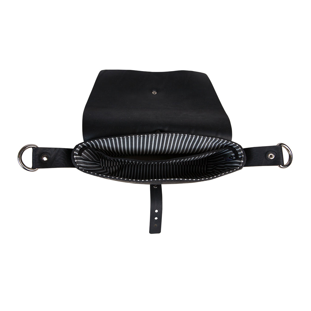Top view of open black vegan handbag by Paguro Upcycle showing striped interior lining and strap details