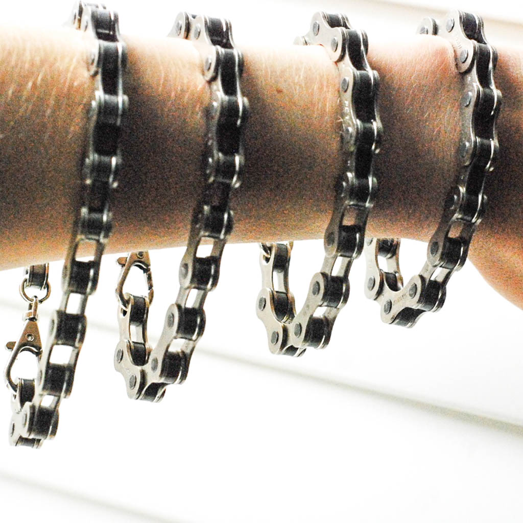 Paguro Upcycle recycled bike chain bracelet shown in multiple sizes on wrist with metal clasp