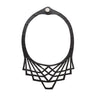 Paguro Upcycle upcycled inner tube necklace black geometric layered cutout design with silver snap closure