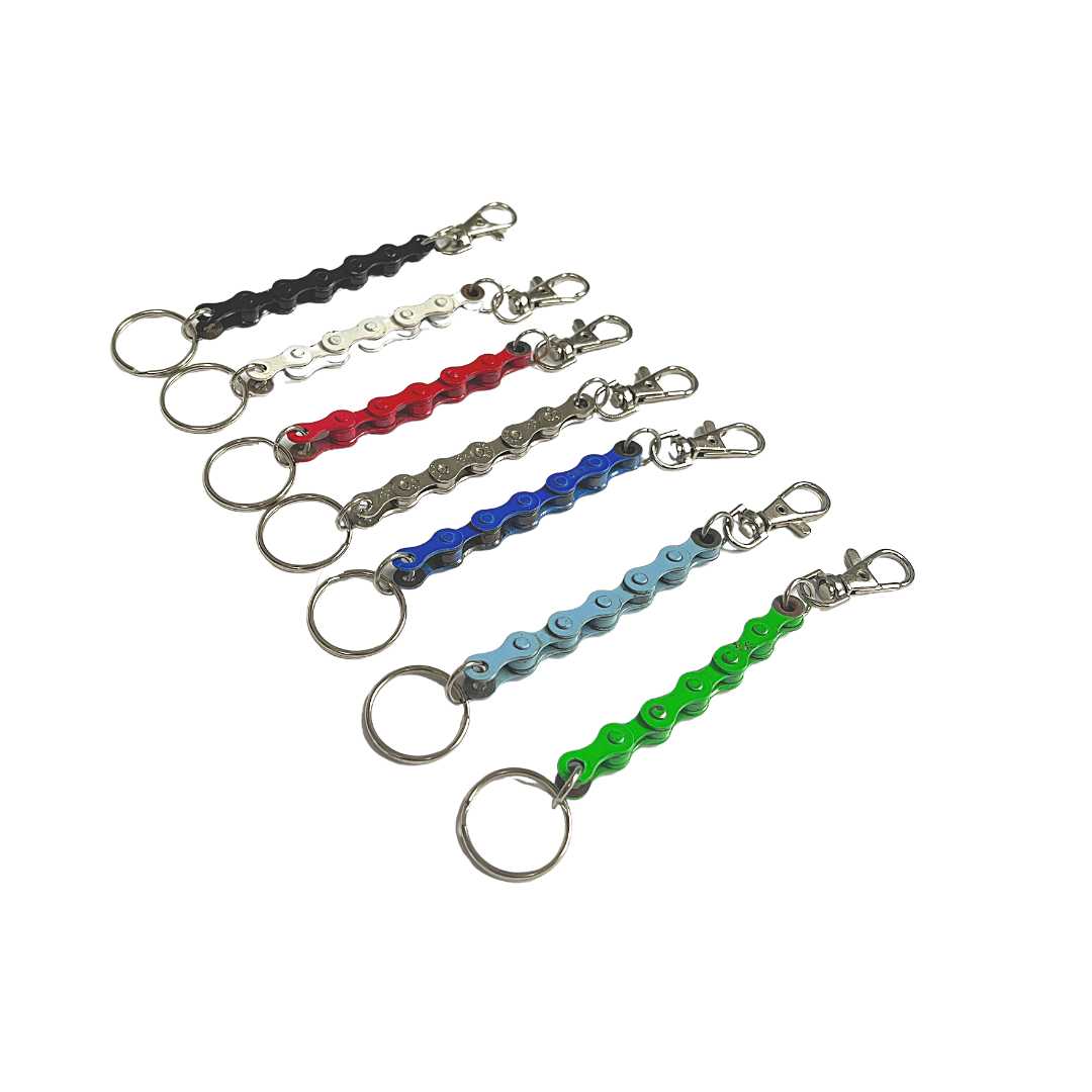 Paguro Upcycle recycled bike chain keyring in multiple colors including black, white, red, silver, blue, light blue, and green