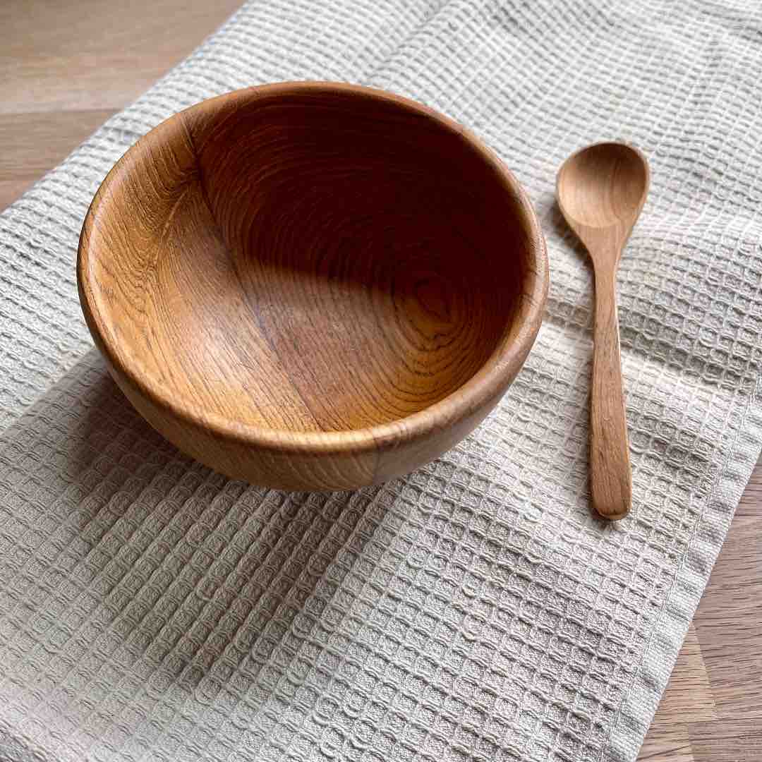 Paguro Upcycle small upcycled wooden bowl with matching wooden spoon on textured cloth